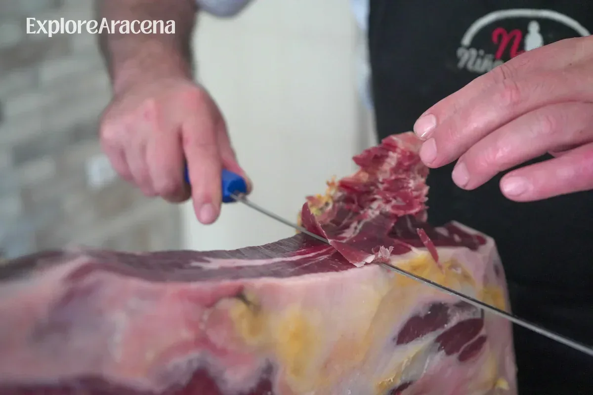hand-slicing-thin-jamon-slice-in-aracena